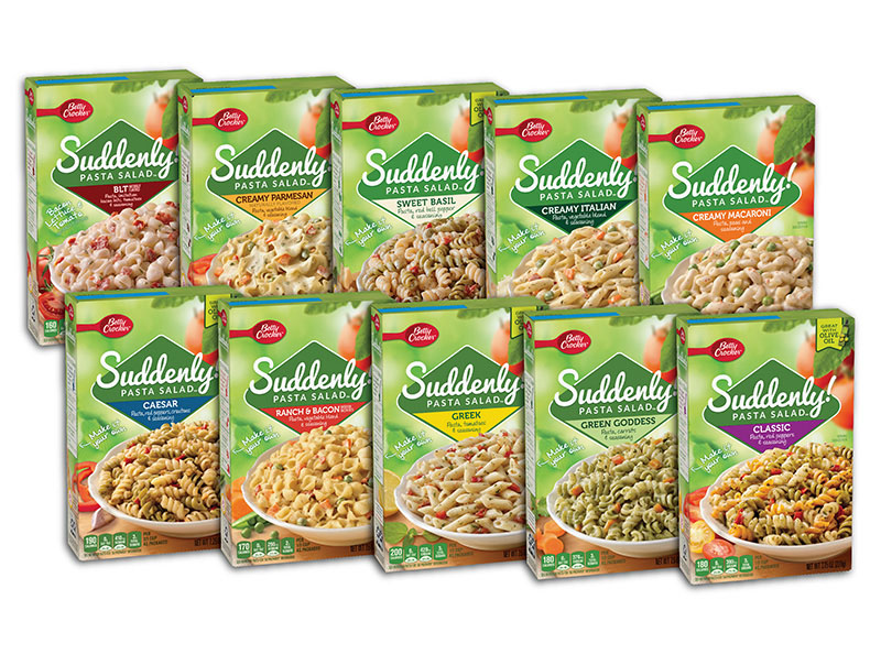 Two rows of ten green boxes of Suddenly Salad products ranging from Creamy Macaroni to Ranch and Bacon. 